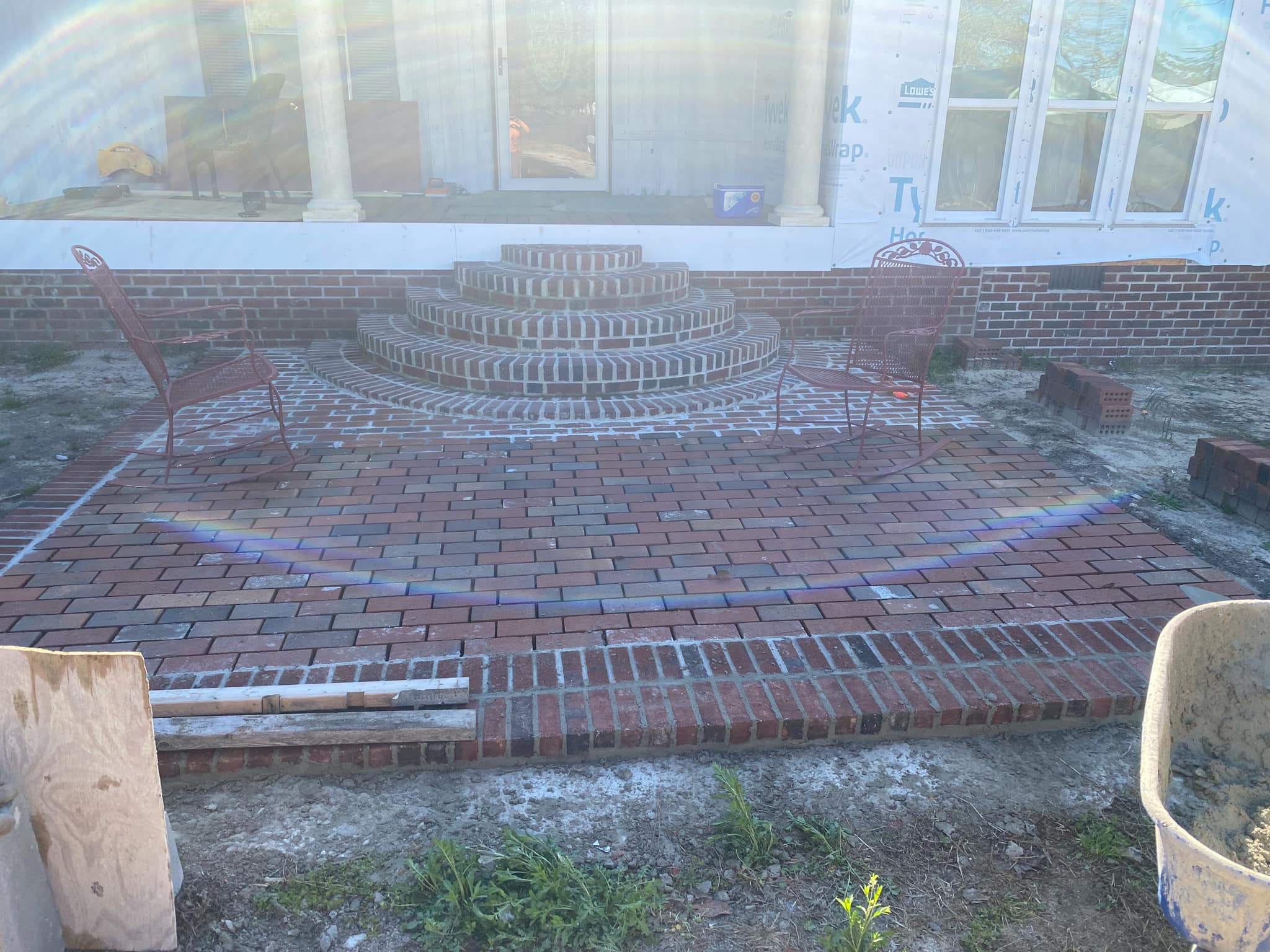 Curved brick steps and patio