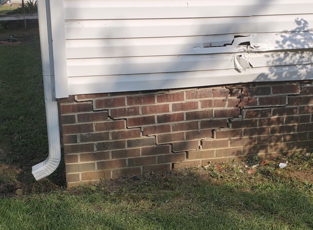 Damaged brick before repair
